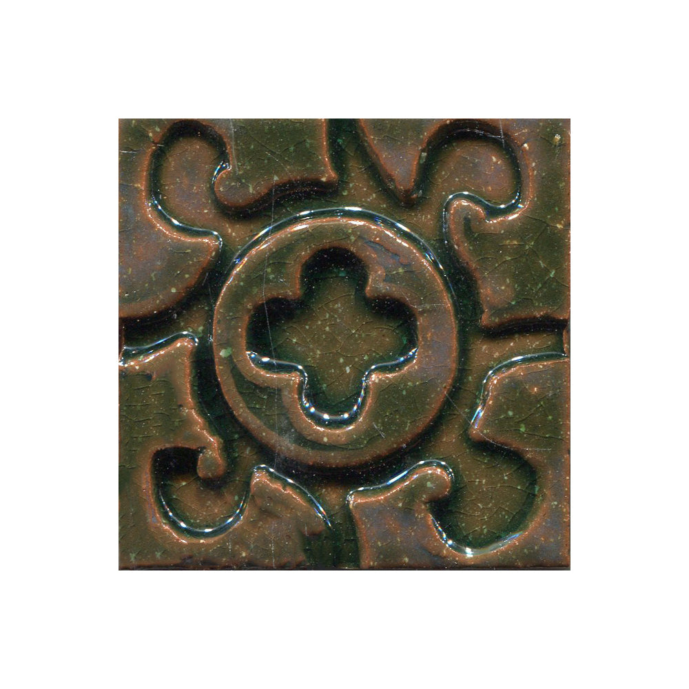A collection of tiles featuring a stamped clover pattern in Lime green
