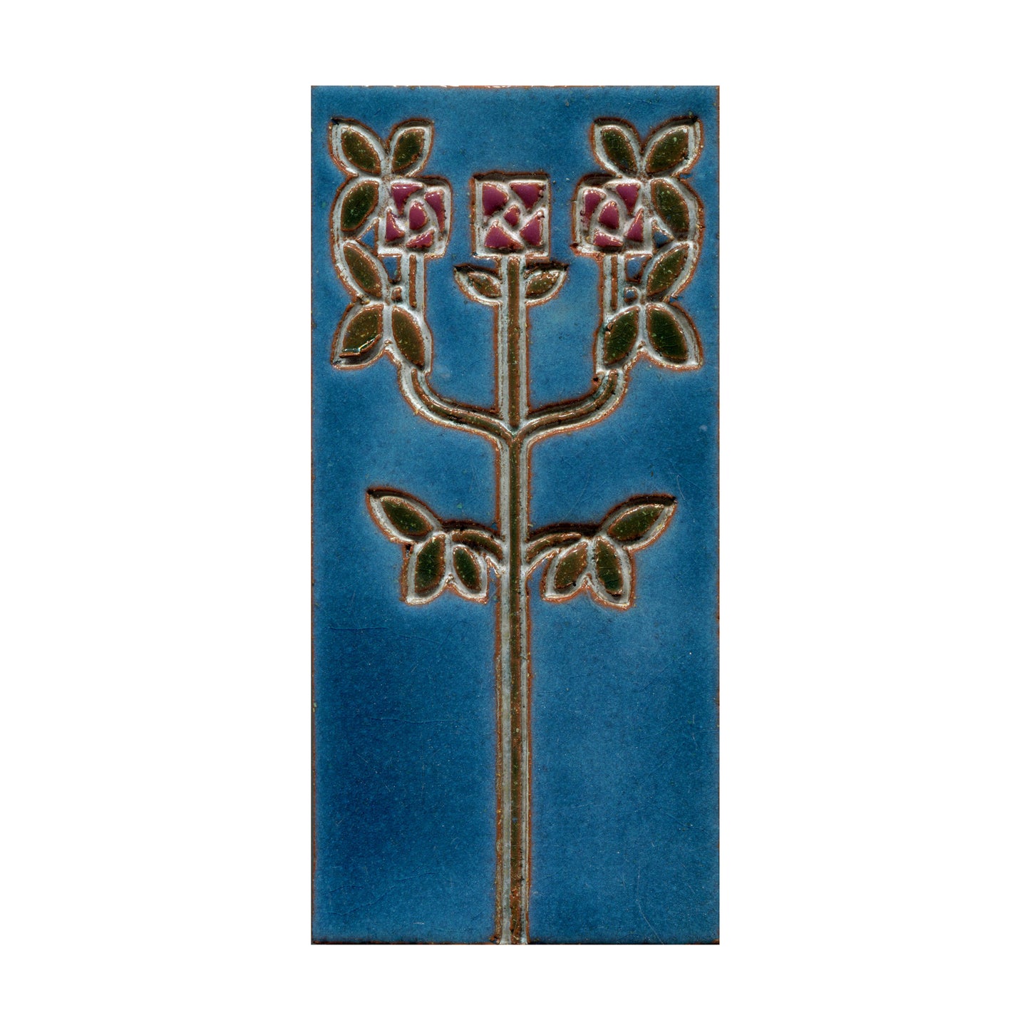 A rectangular ceramic tile with a hand-painted Art Nouveau floral design, featuring three roses in pink and green on a blue background.