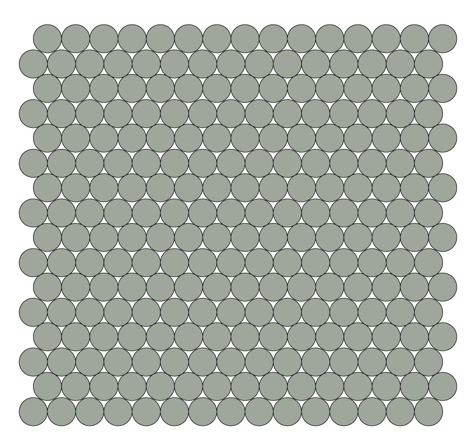 A grid of round unglazed porcelain tiles in celadon green.