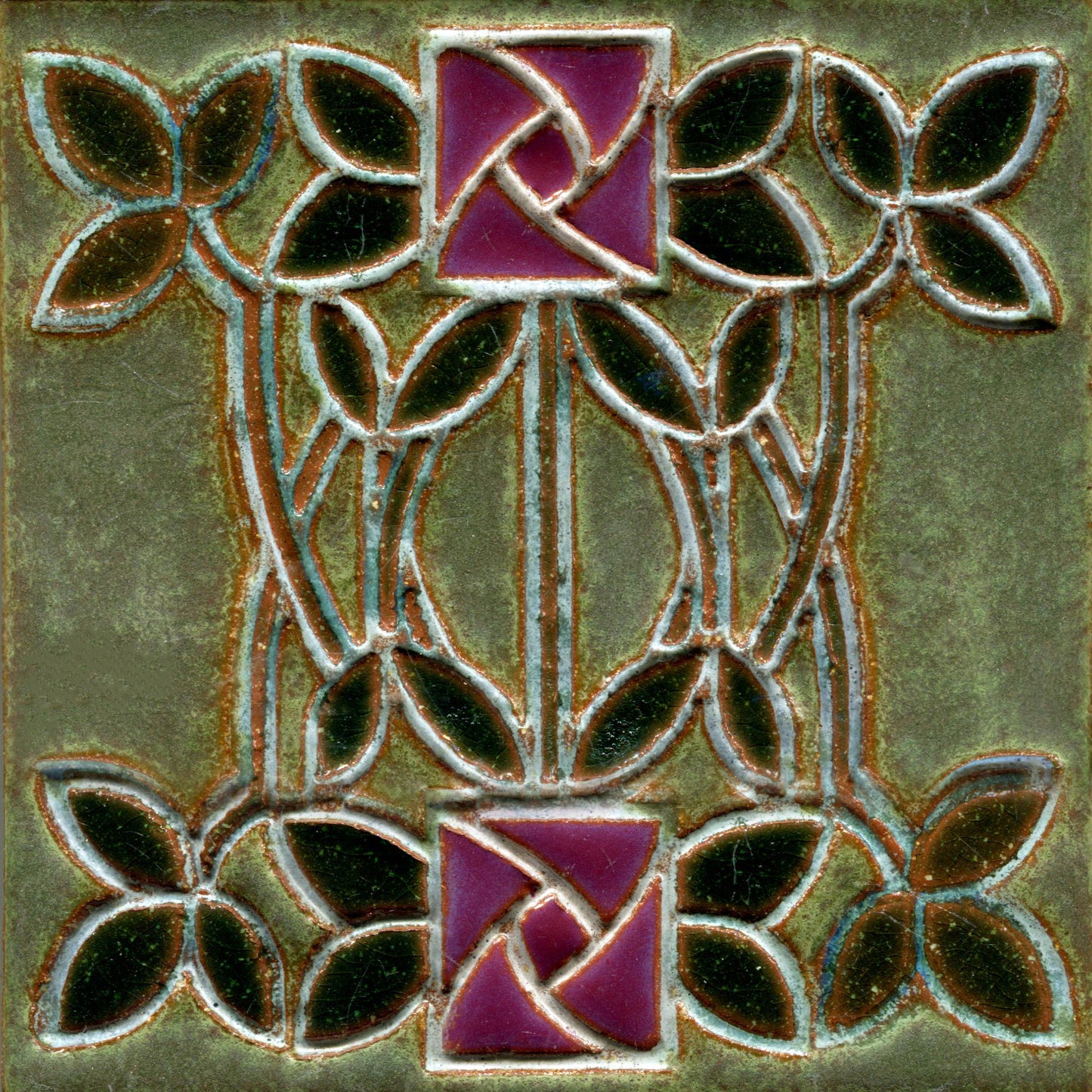 Decorative tile with purple knot design and leaves on a green background