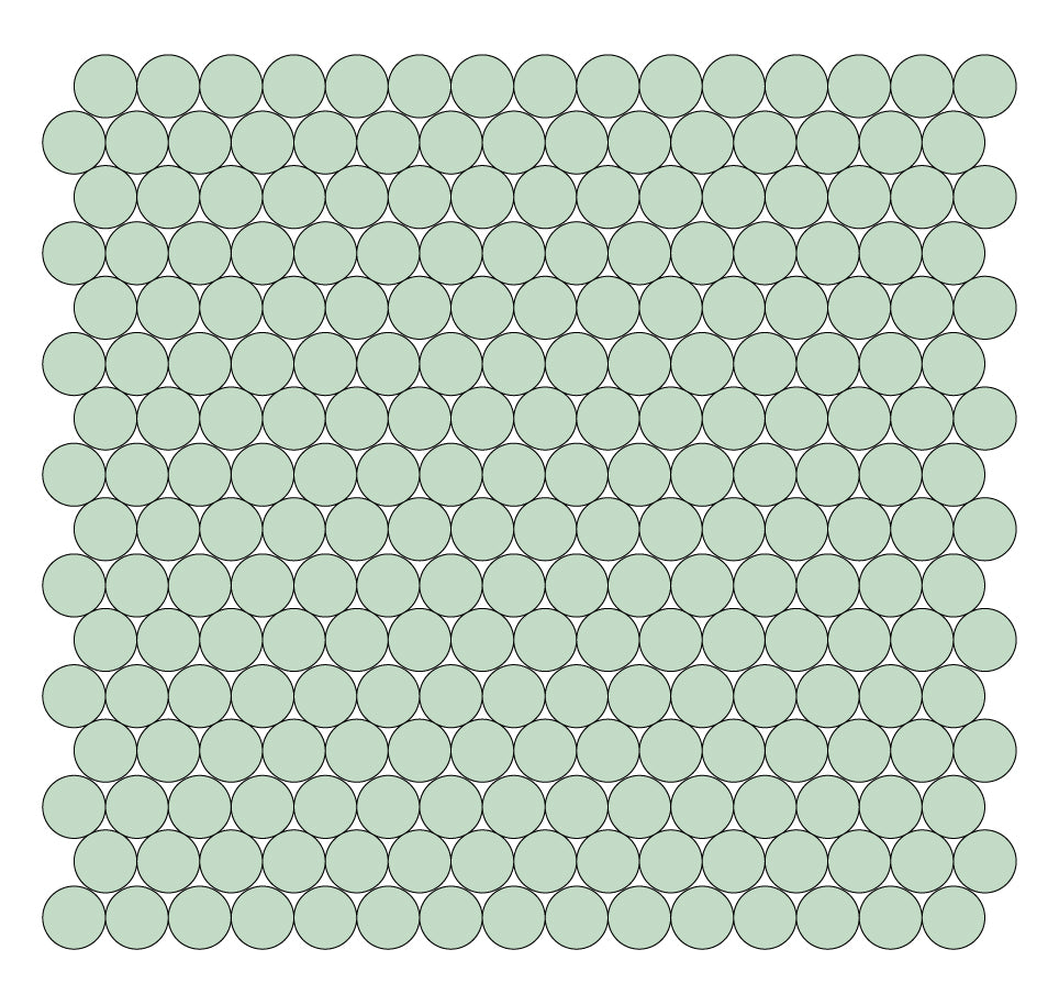 A grid of round unglazed porcelain tiles in light green