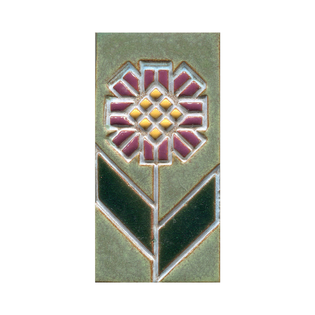 Decorative tile with geometric floral design on a green background