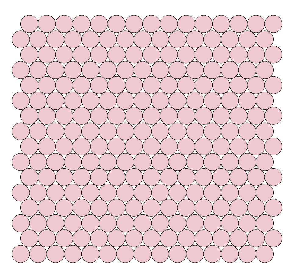 A grid of round unglazed porcelain tiles in Rose