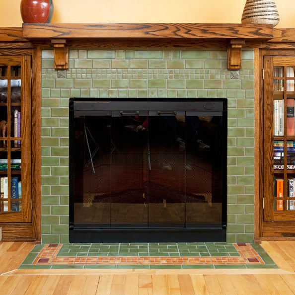 The Davenport fireplace with Pesto 2x4 tiles with ginkgo leaf accent tiles