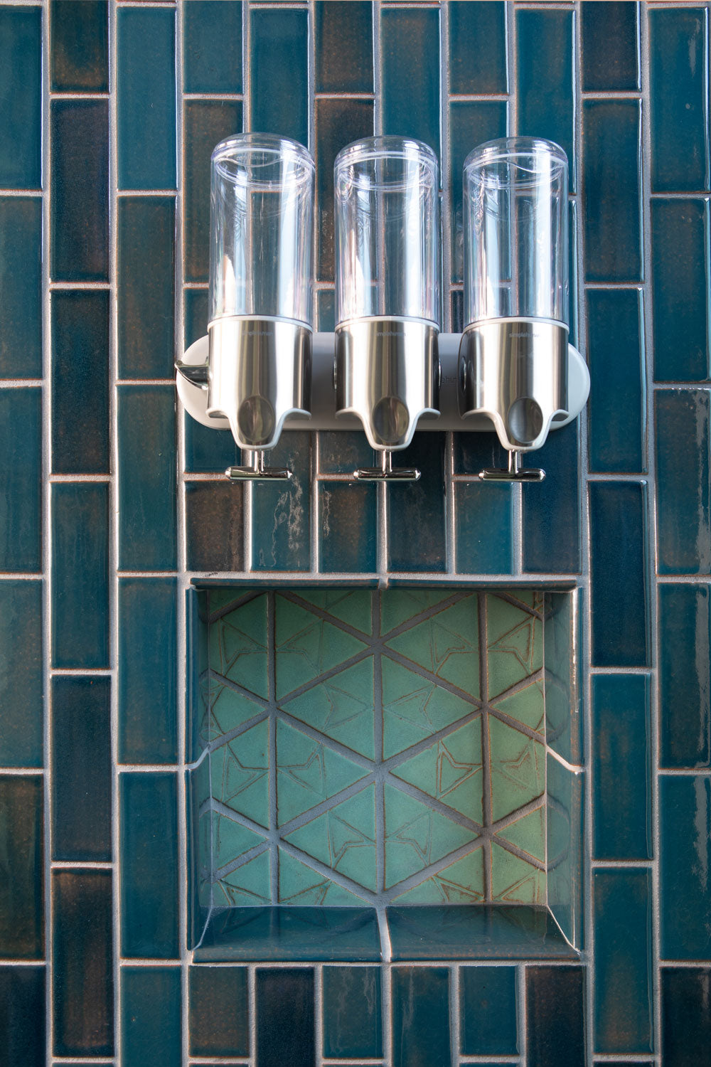 tile niche with Laurel Triangle tiles.