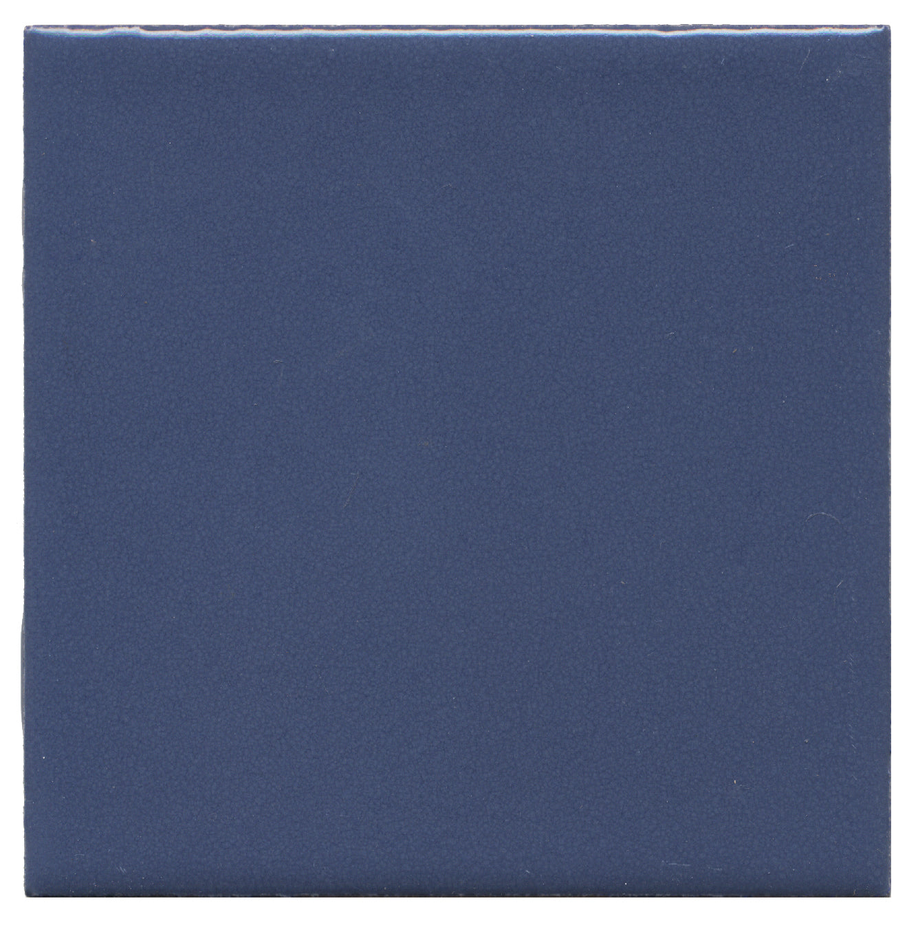 A solid dark blue ceramic tile