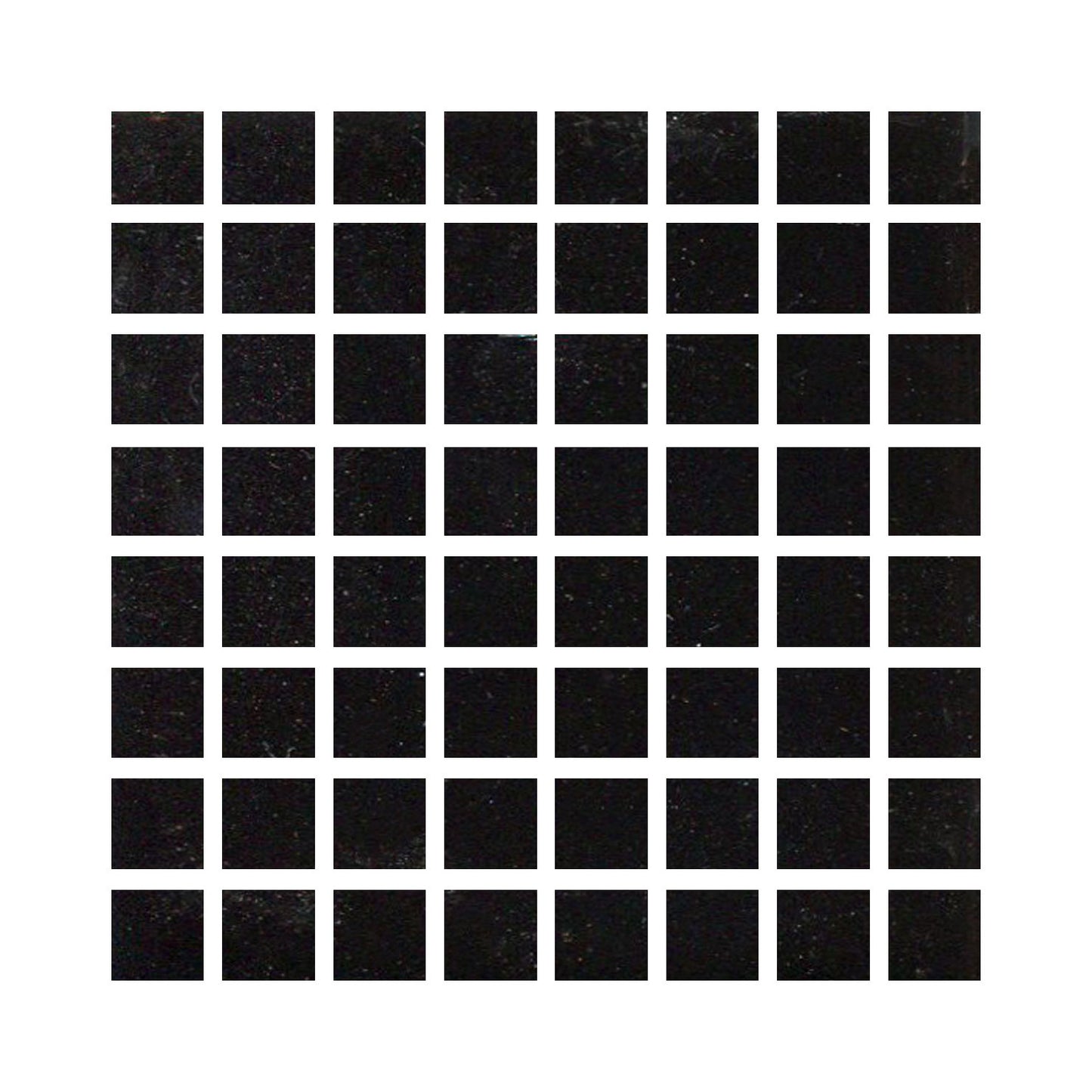 Black ceramic tiles showing a gloss black color with hints of blue.