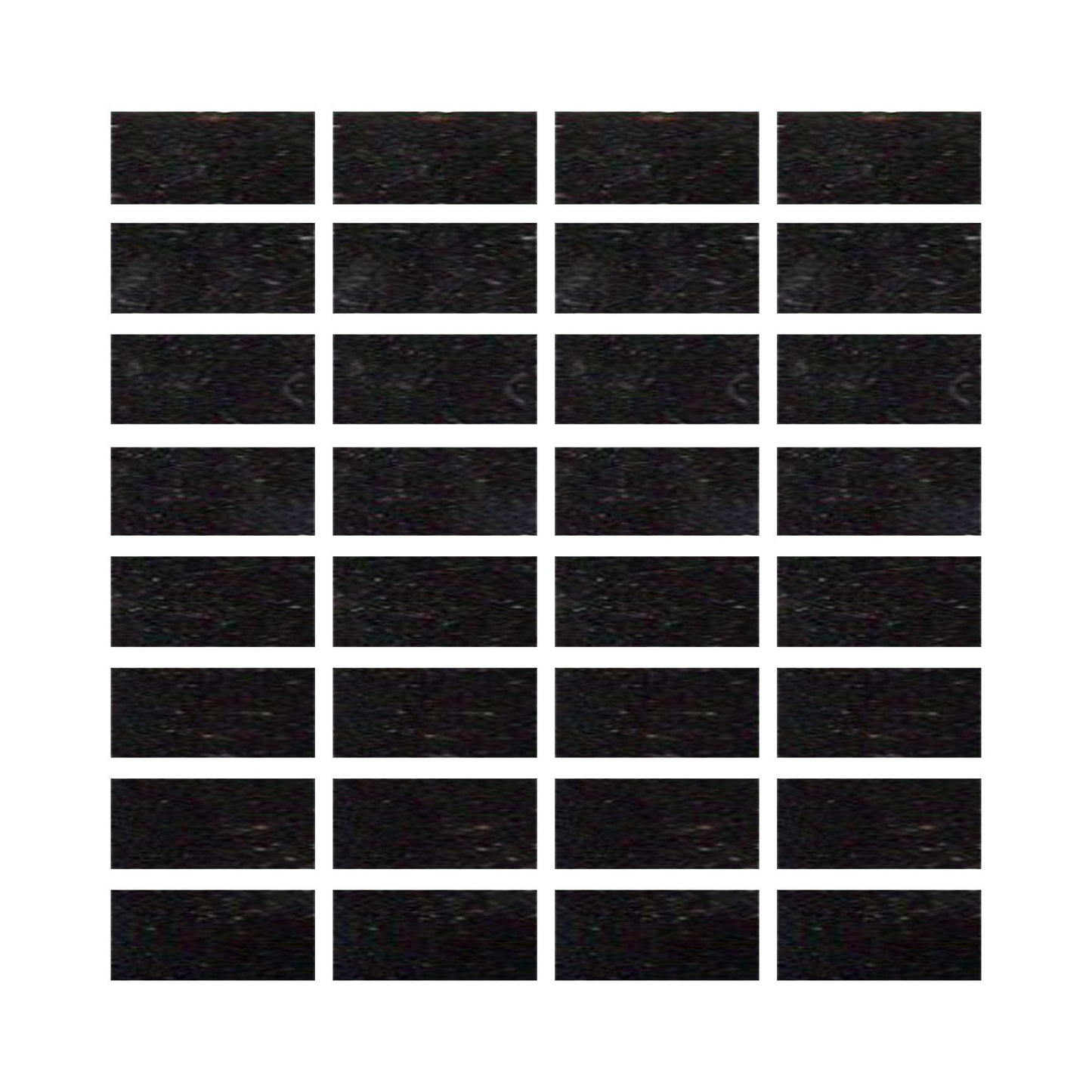 Black ceramic tiles showing a gloss black color with hints of blue.