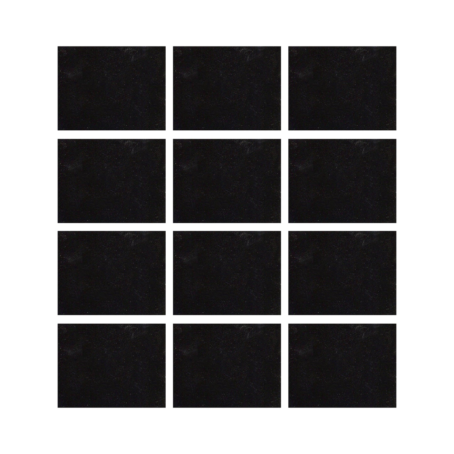 Black ceramic tiles showing a gloss black color with hints of blue.