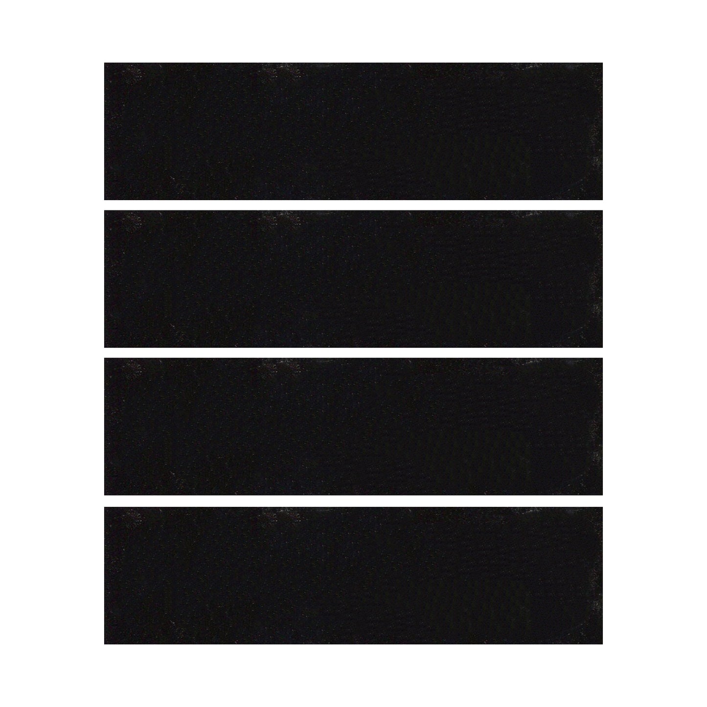 Black ceramic tiles showing a gloss black color with hints of blue.