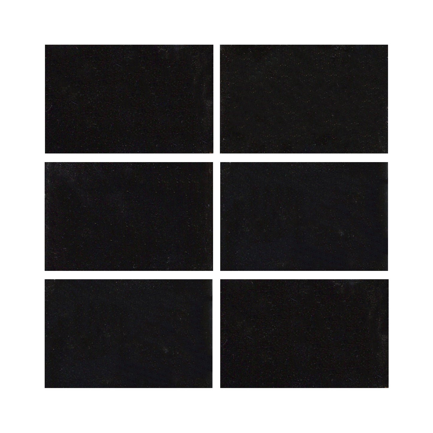 Black ceramic tiles showing a gloss black color with hints of blue.