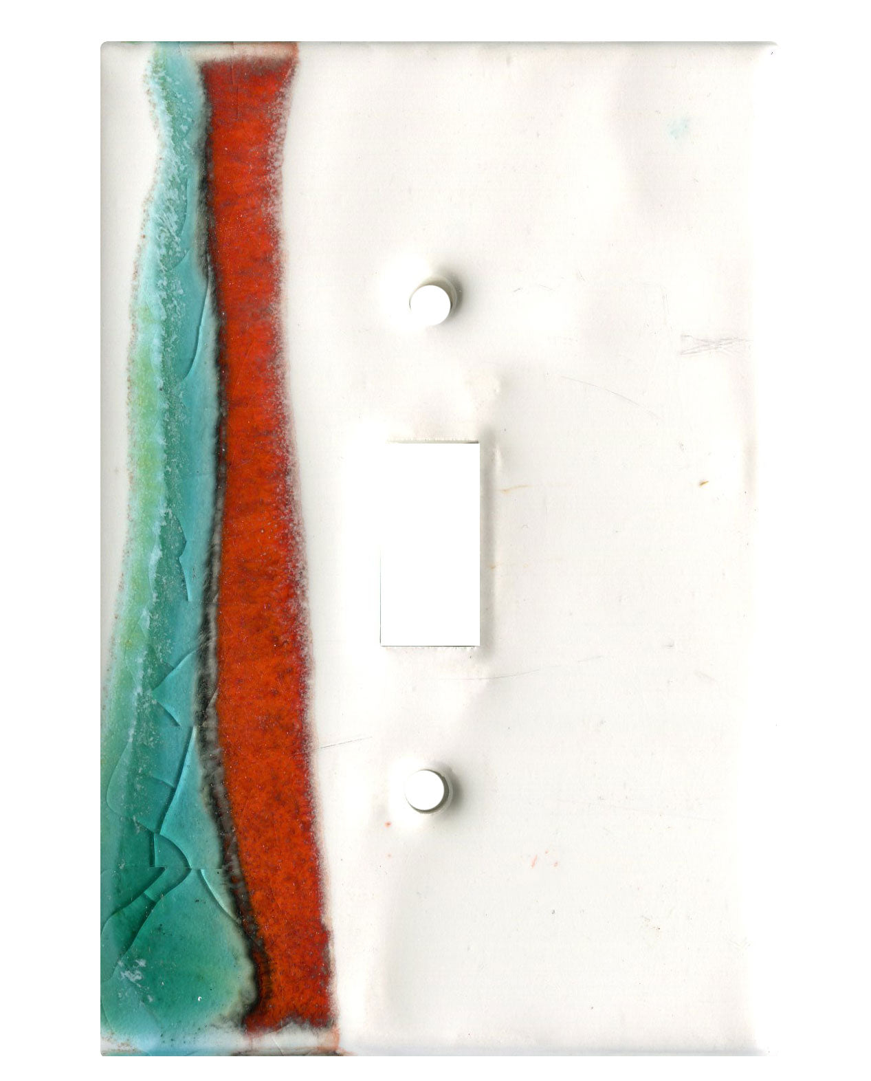 A ceramic switch plate with a white background and two gamma rays of color in red and blue.