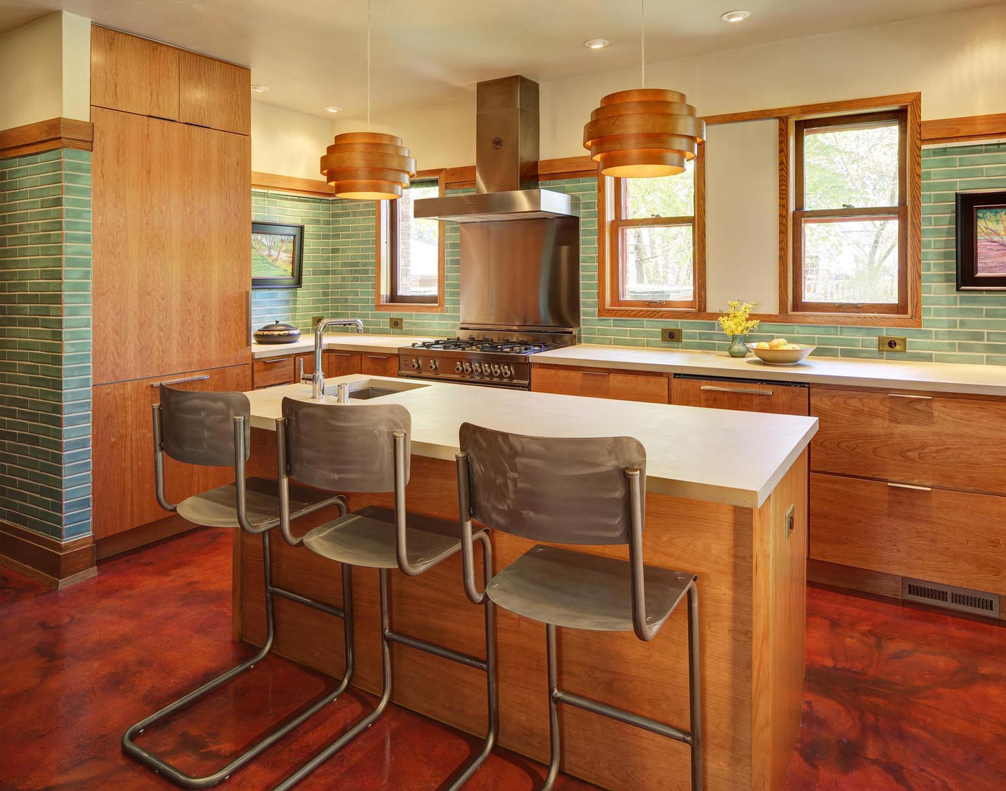 Mid-century kitchen in2x8 matte finish, transitioning in color from light green to turquoise.