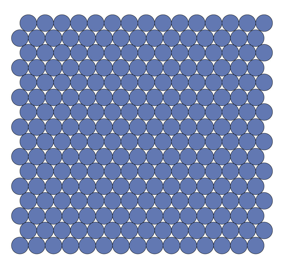 A grid of round unglazed porcelain tiles in denim blue