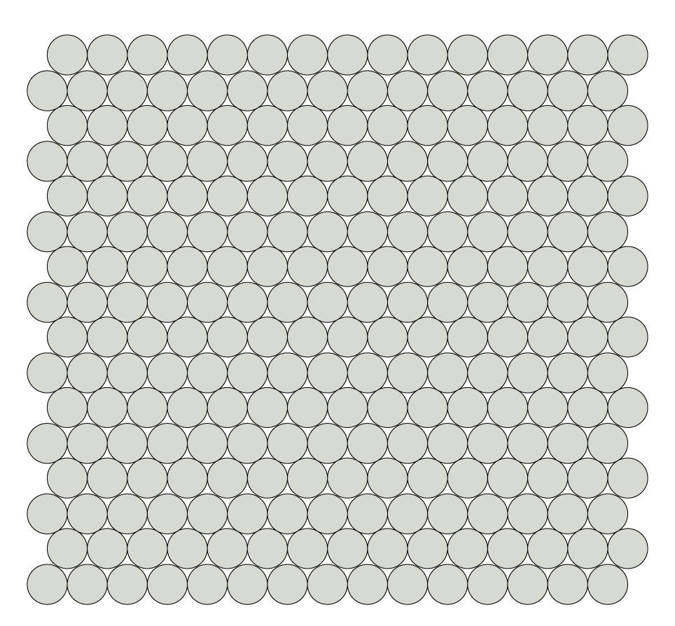 A grid of round unglazed porcelain tiles in light grey