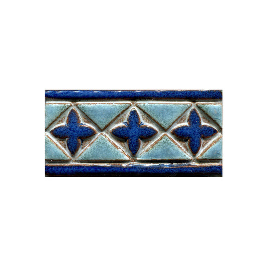Decorative tile with blue star patterns