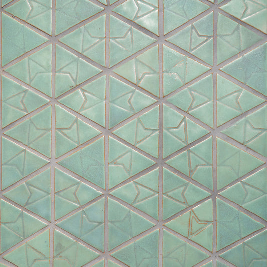 Laurel Triangle tiles. Light relief stamp creates three  designs in the pattern